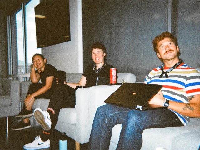 team sitting on a couch