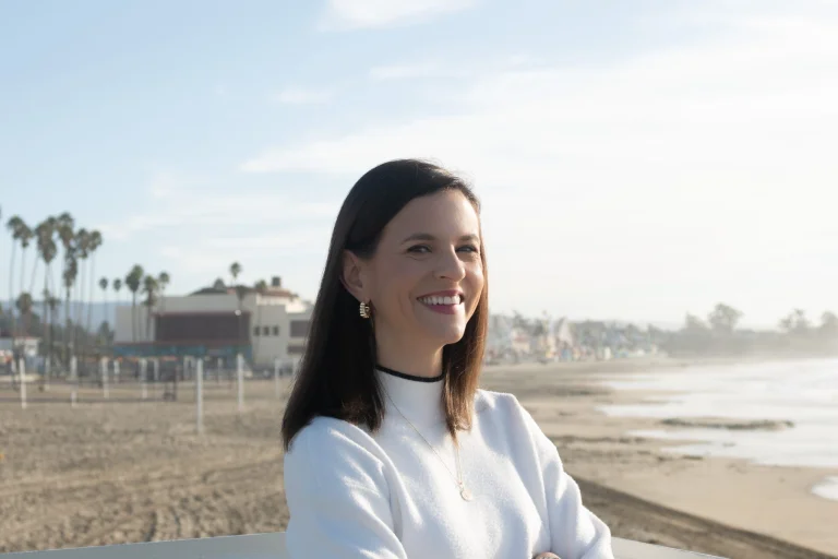 Raquel Alexander, CMO of Nav, headshot on beach